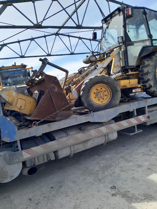 Dezmembrez buldoexcavator ford New  holland
