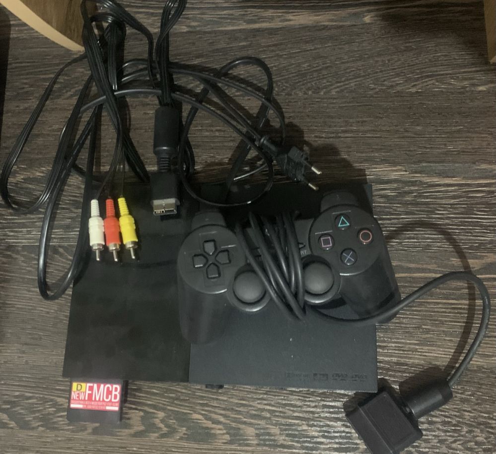 Продам plastation 2 прошитый закачивай с интернета игры и играй!