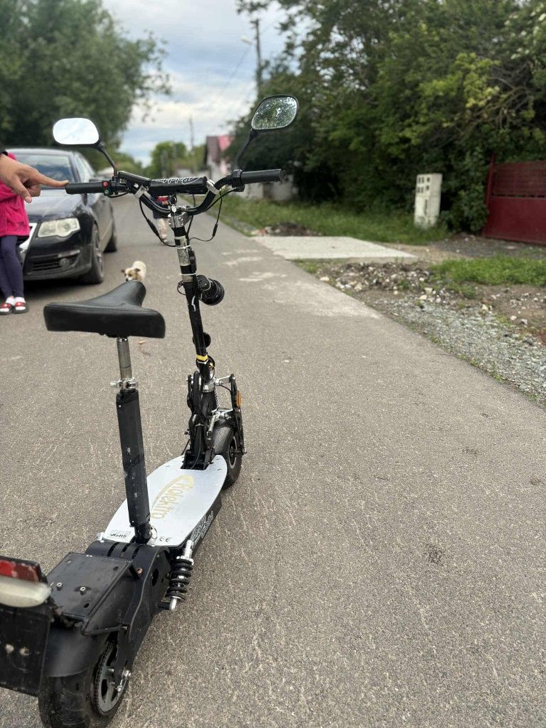 Dau scuter  electric foarte puternic la schimb pe boxe active mari pas
