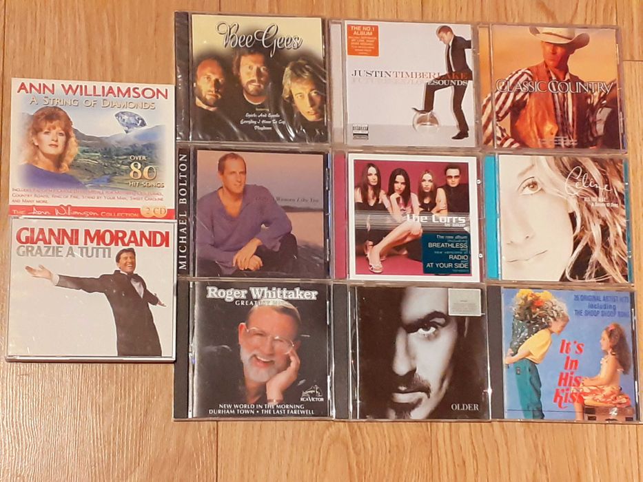 60 броя оригинални дискове (CD) с английска музика