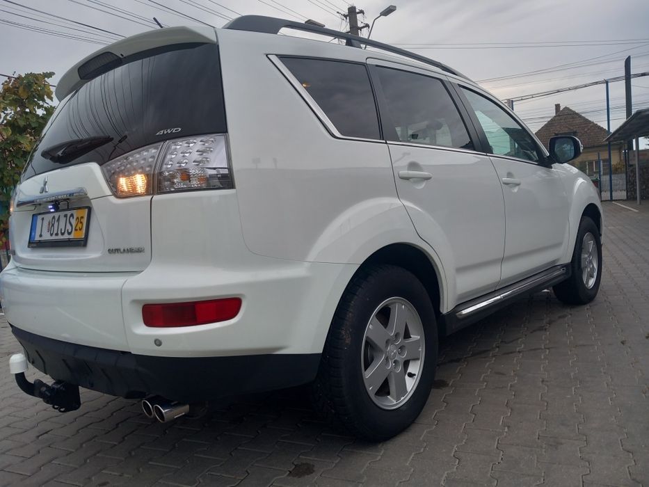 Mitsubishi Outlander an 2012 . Euro5.  7LOCURI.