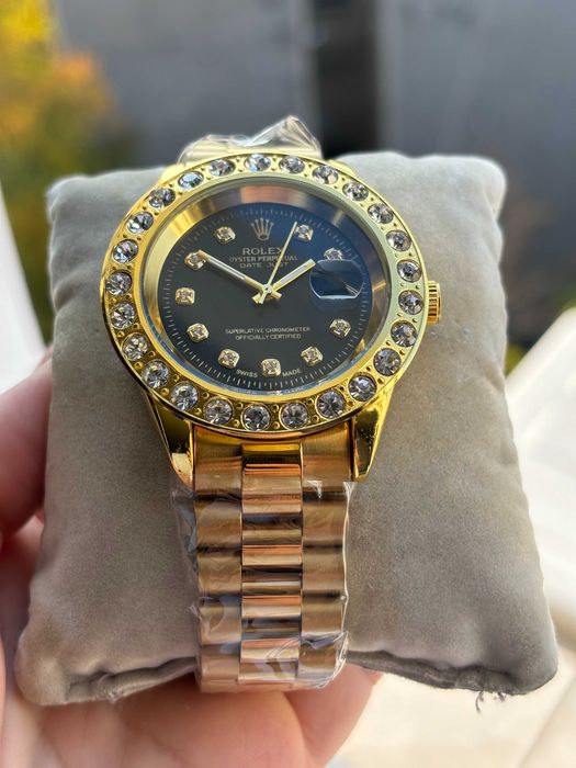 Ceas dama/barbatesc Auriu cu interior Negru 18K