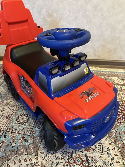 Продам толокар с поворотной родительской ручкой