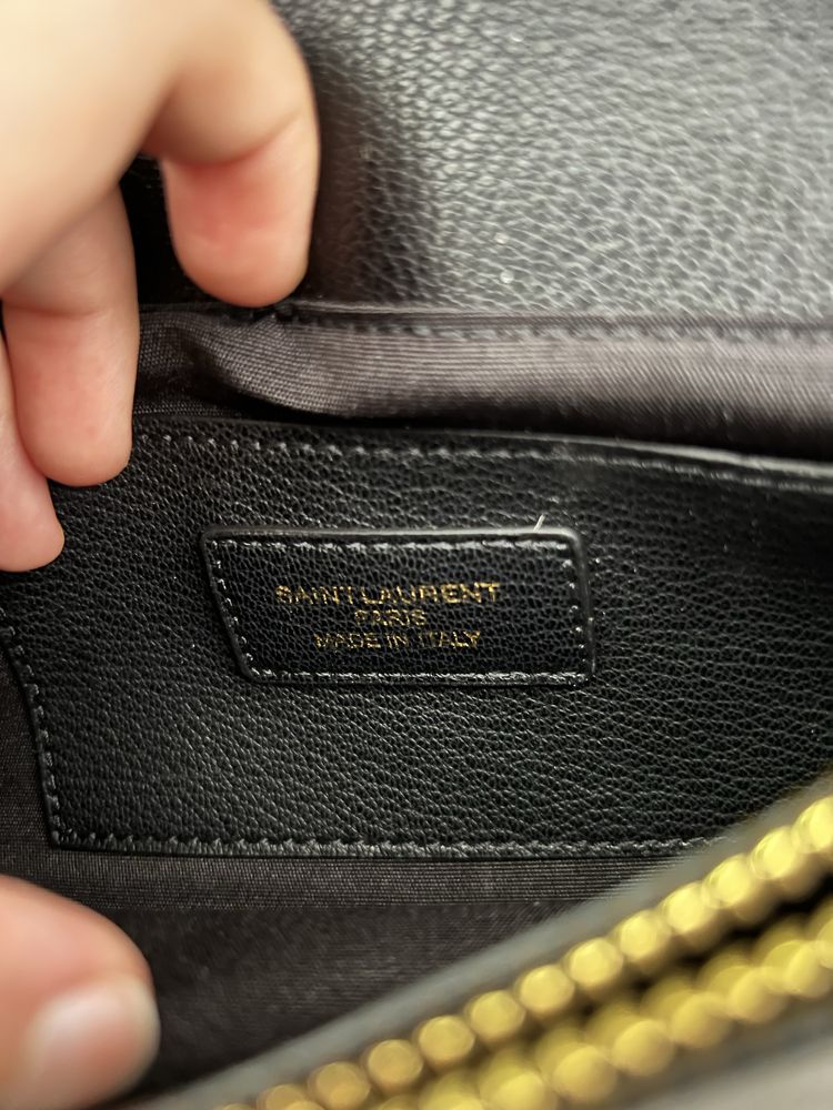 Чанти и портмоне на марката ysl