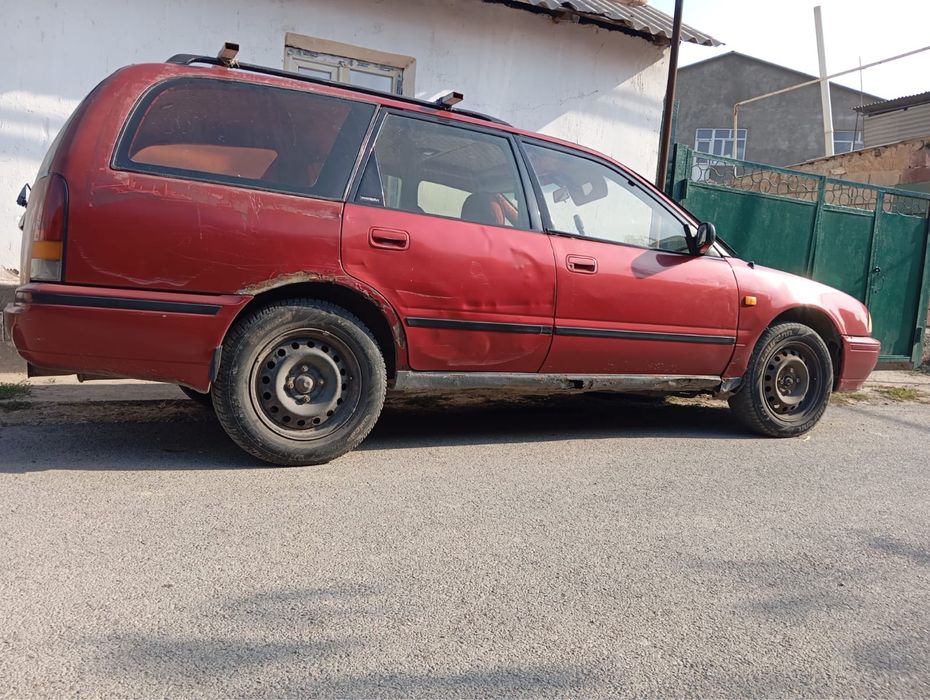 Машина ниссан примера