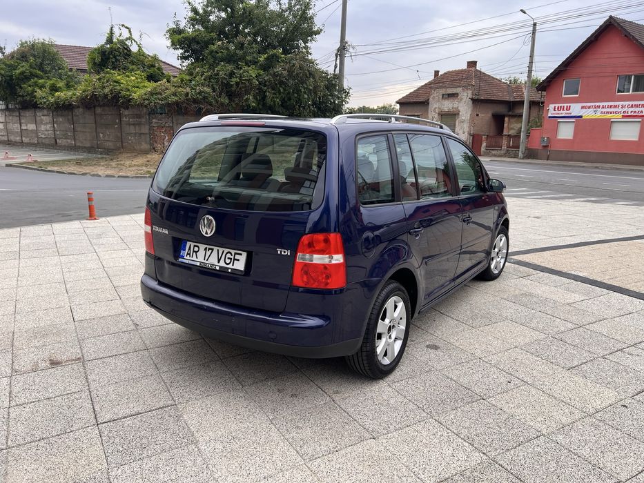 Vand sau schimb vw turan dsg 7 locuri