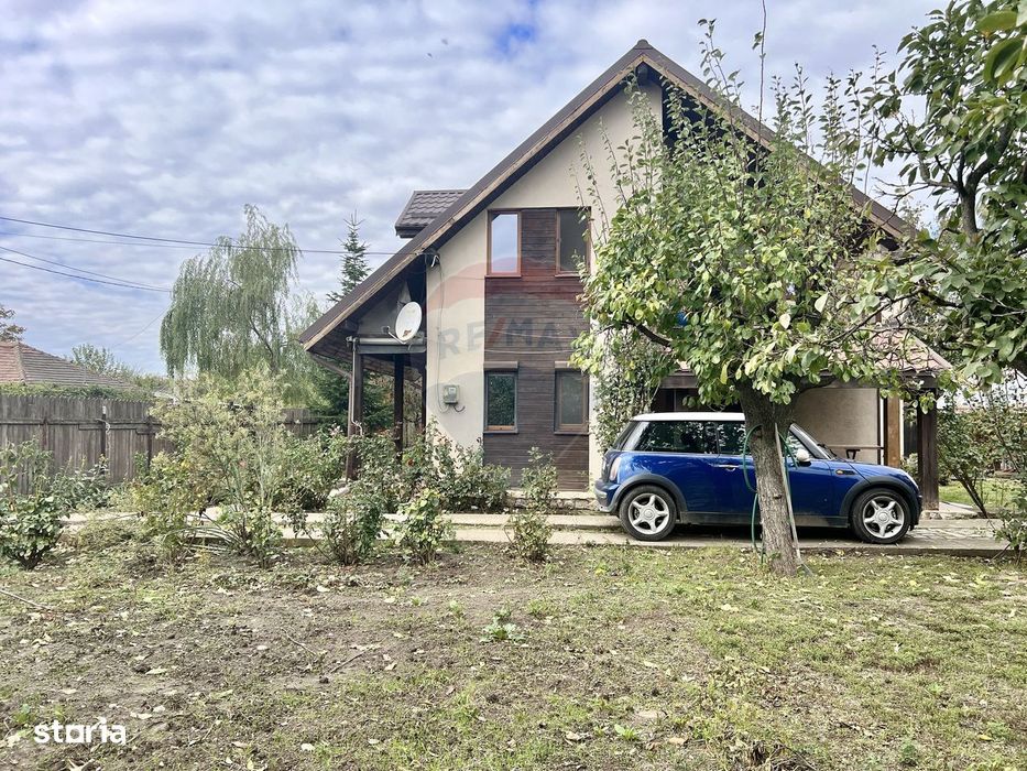 Casă de lemn cu teren generos de 1312 mp de vânzare în Fundulea