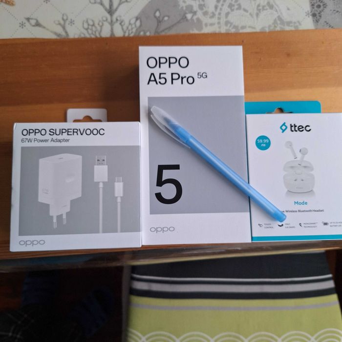 Oppo A5 pro 5G 256/8, заедно със зарядно и слушалки.