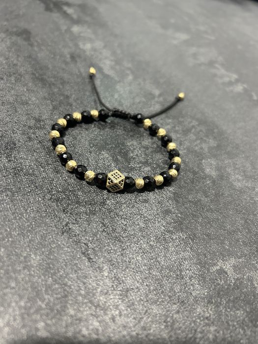 Bratara cu bilute din aur si zar cu pietricele negre din aur