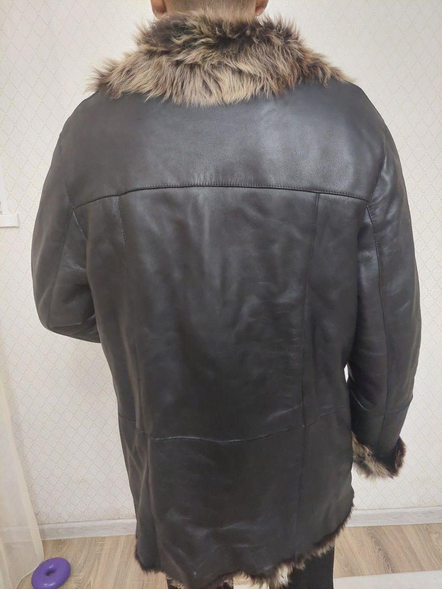 Коженная куртка на меху мех волка и шапка норковая