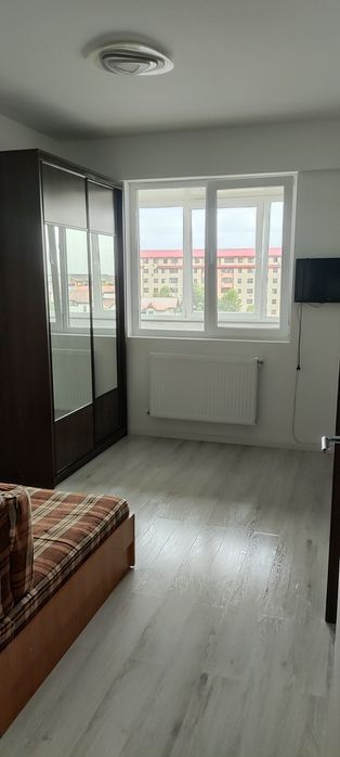 Închiriez sau vand la pretul de 70000 euro ap cu 2 camere in cartierul