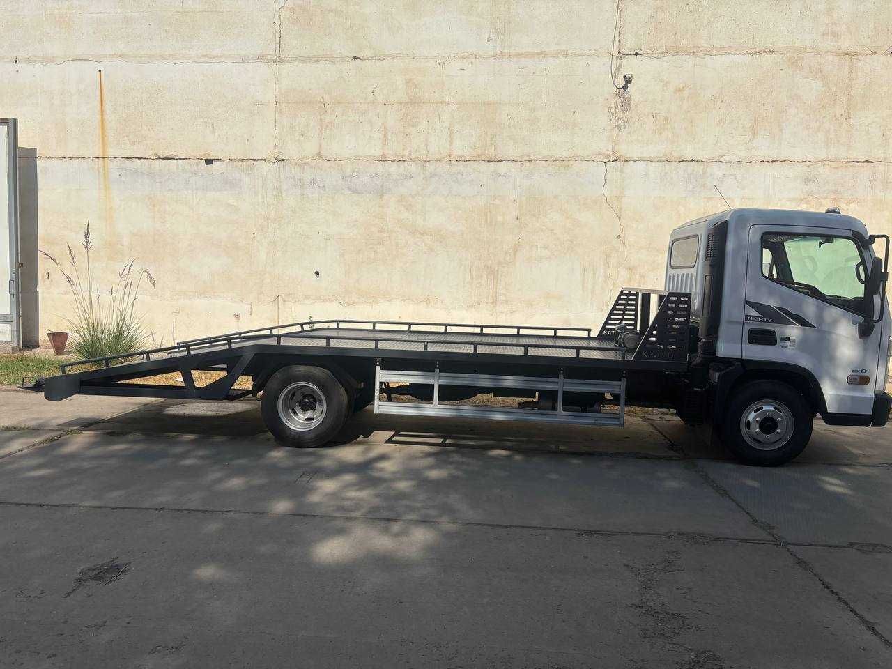 Эвакуатор с ломаной платформой HYUNDAI EX8 3,5 т