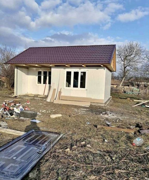Case și cabane din lemn