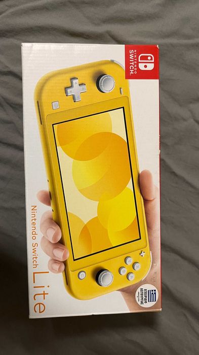 For sale: Nintendo Switch Lite Like New (Yellow)