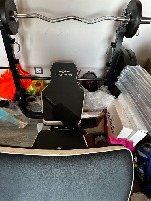 Мултифункционална лежанка за вдигане на тежести и упражнения