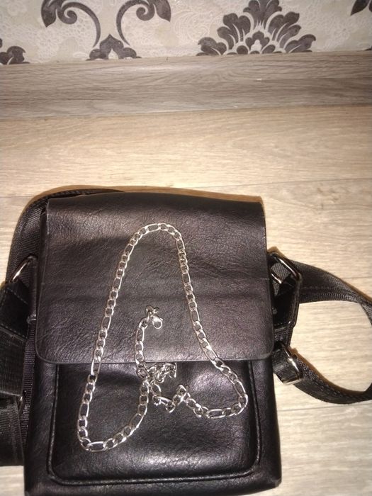 Продам барсетку мужскую