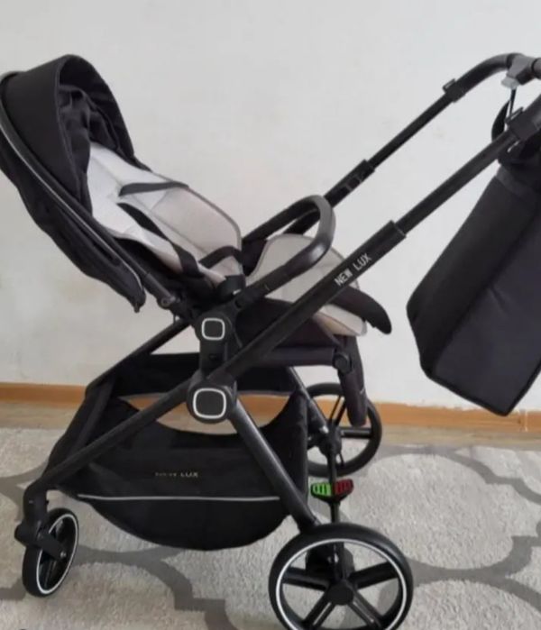 Продам детскую коляску New lux