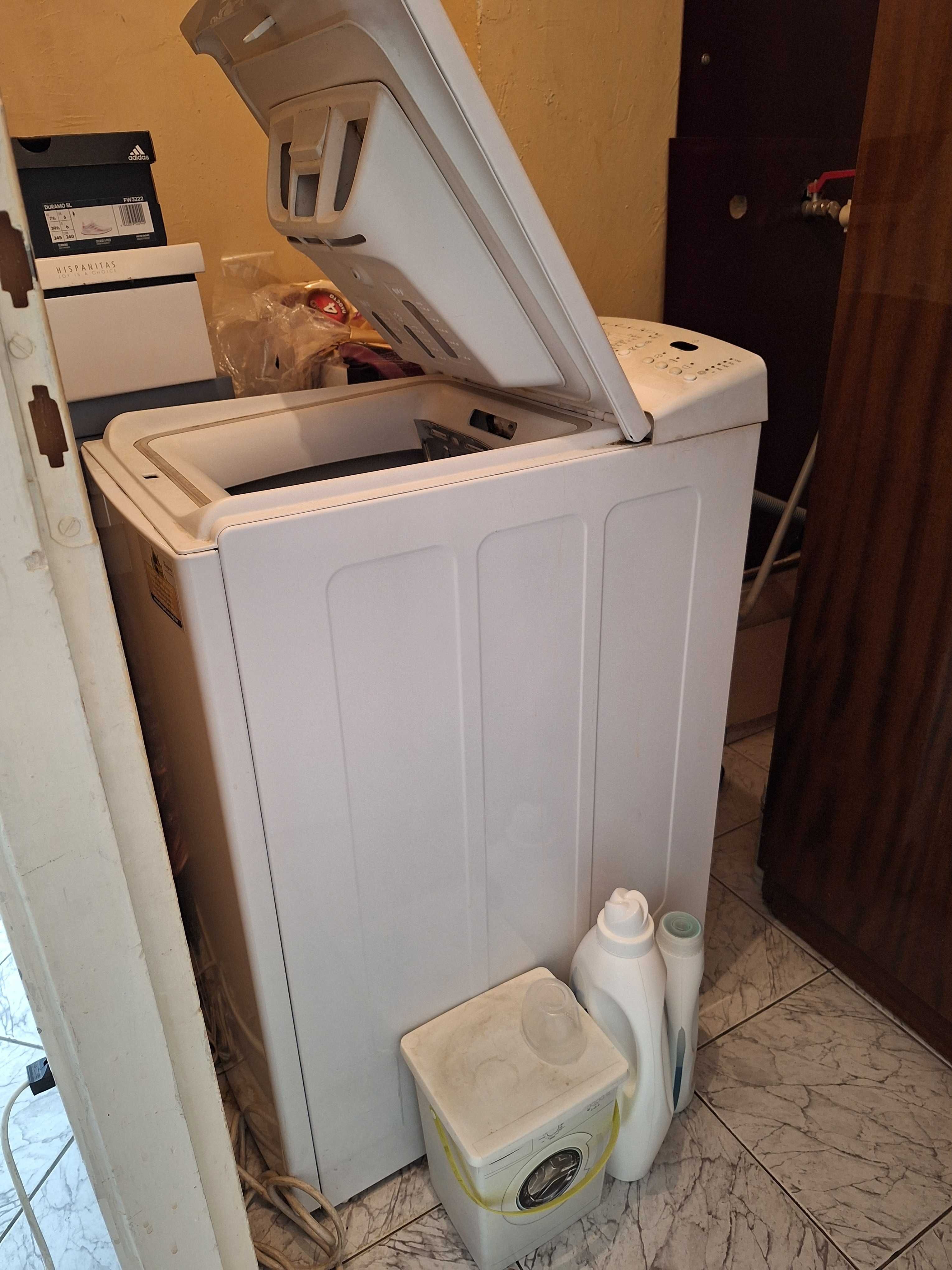Перална машина Whirlpool с горно зареждане