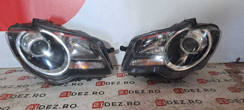 Faruri / Far stanga, Far dreapta cu lupa fara xenon VW Touran Facelift