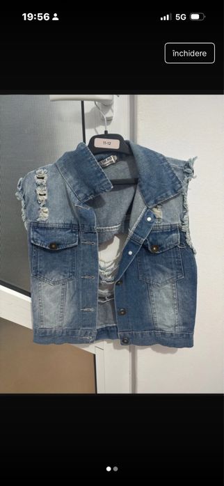 geaca de blugi rupta