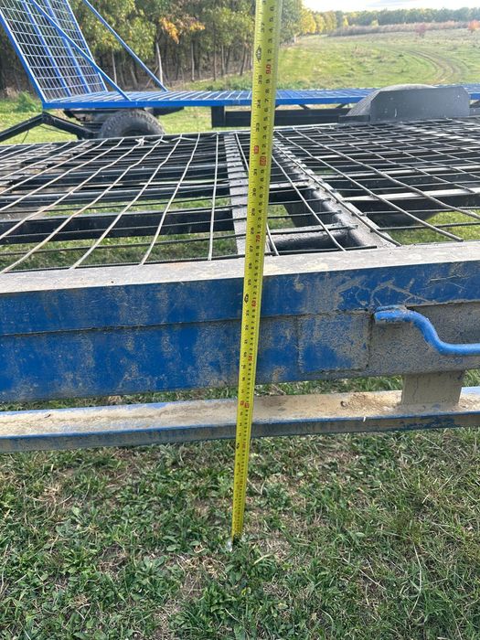 Trailer baloti rotunzi și cisterna