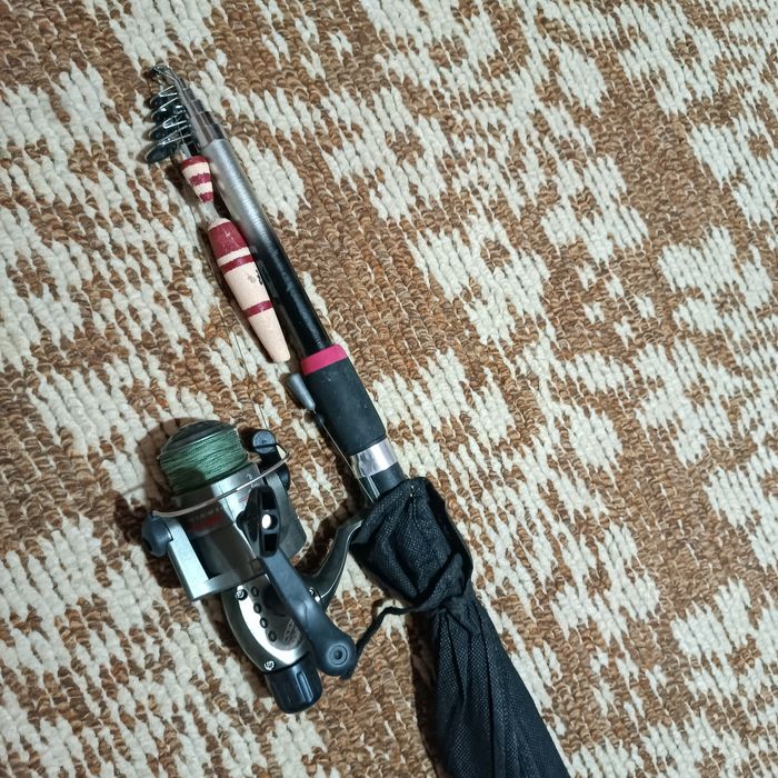 Удочка вместе с катушкой