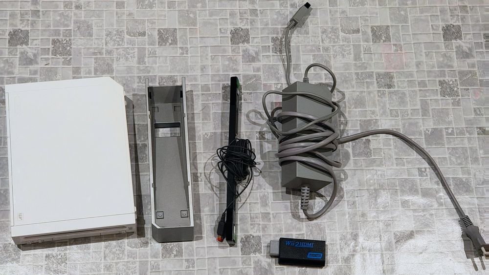 Nintendo wii в отлично състояние с 13 игри и много аксесоари