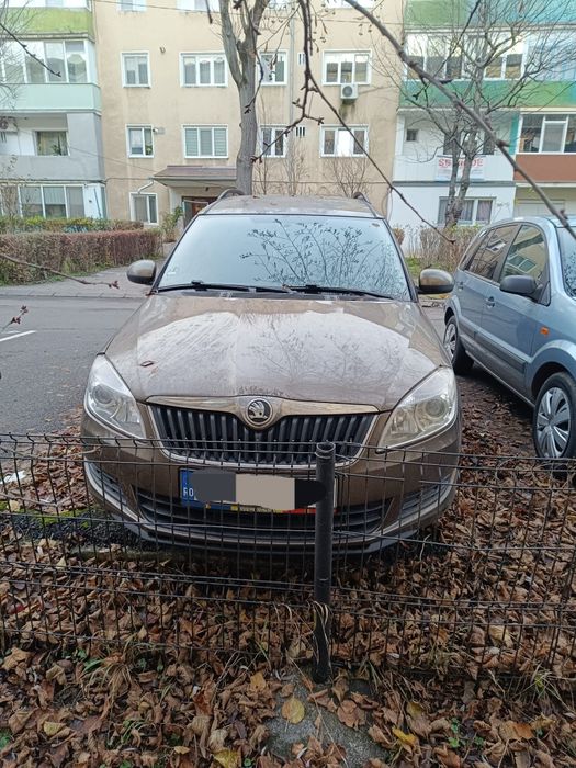 Vând Skoda benzina ,motor de 1,200 An 2014 înmatriculată.14
