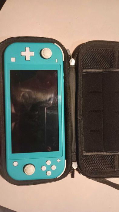 Nintendo switch lite + super smash bros.