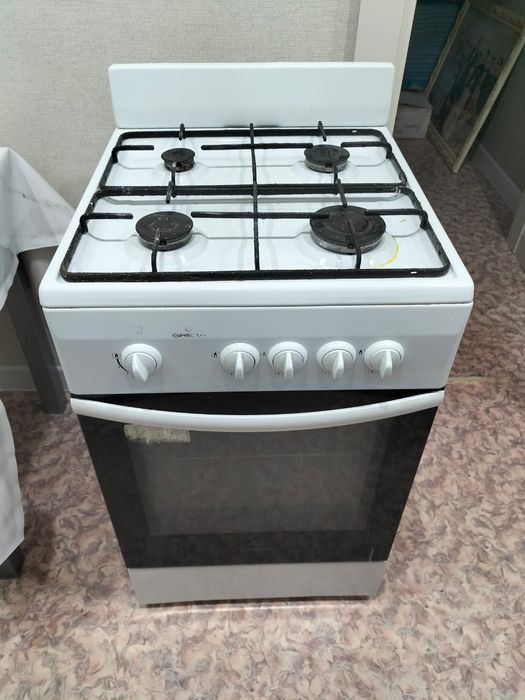 Газовая плита. Б/у очень в хорошем состоянии