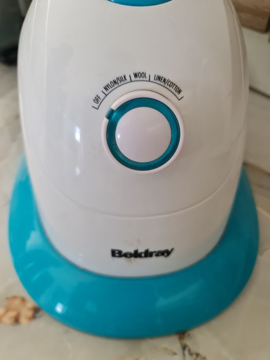 Aparat de călcat vertical