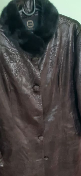 Продам новую дубленку 50-52 размер  ,воротник натральная норка