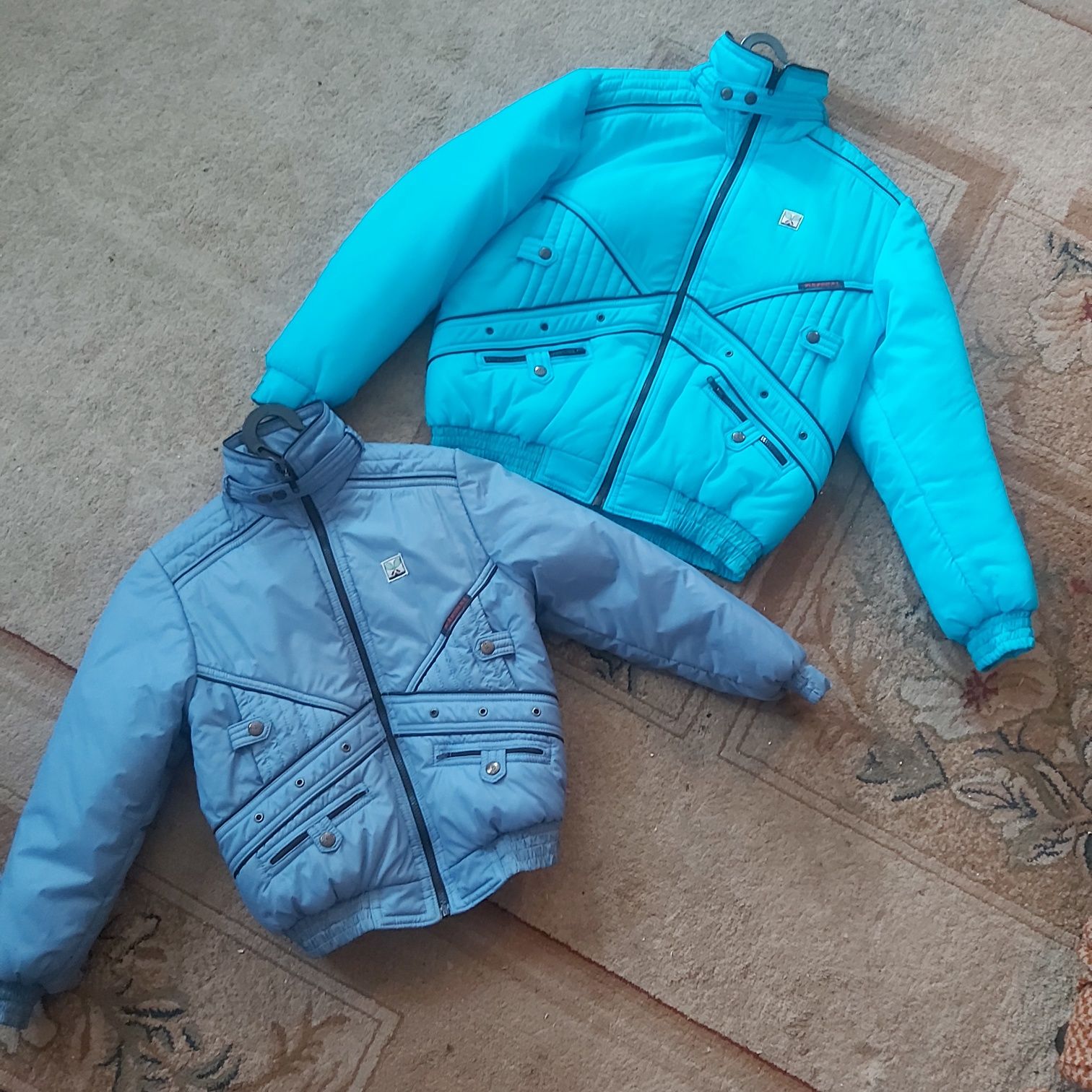 ПРОДАМ новые болониевы куртки (Россия)
