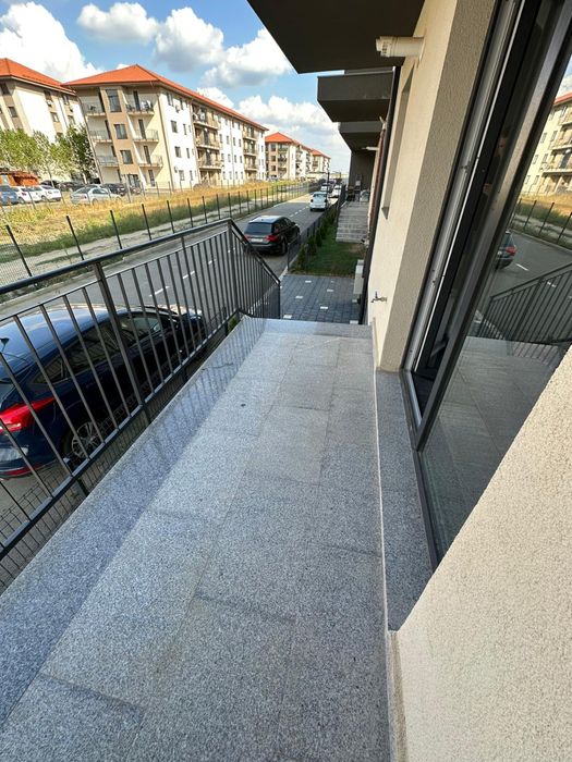 Garsoniera si loc de parcare si curte