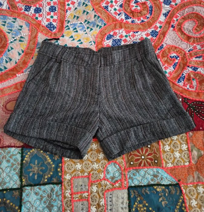 Pantaloni lungi Motivi. Pantaloni scurti Atmosphere