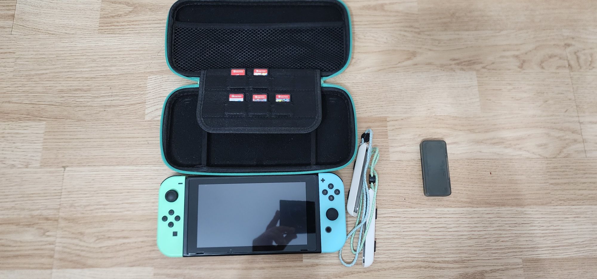 Nintendo Switch Animal Crossing с аксессуарами и играми .