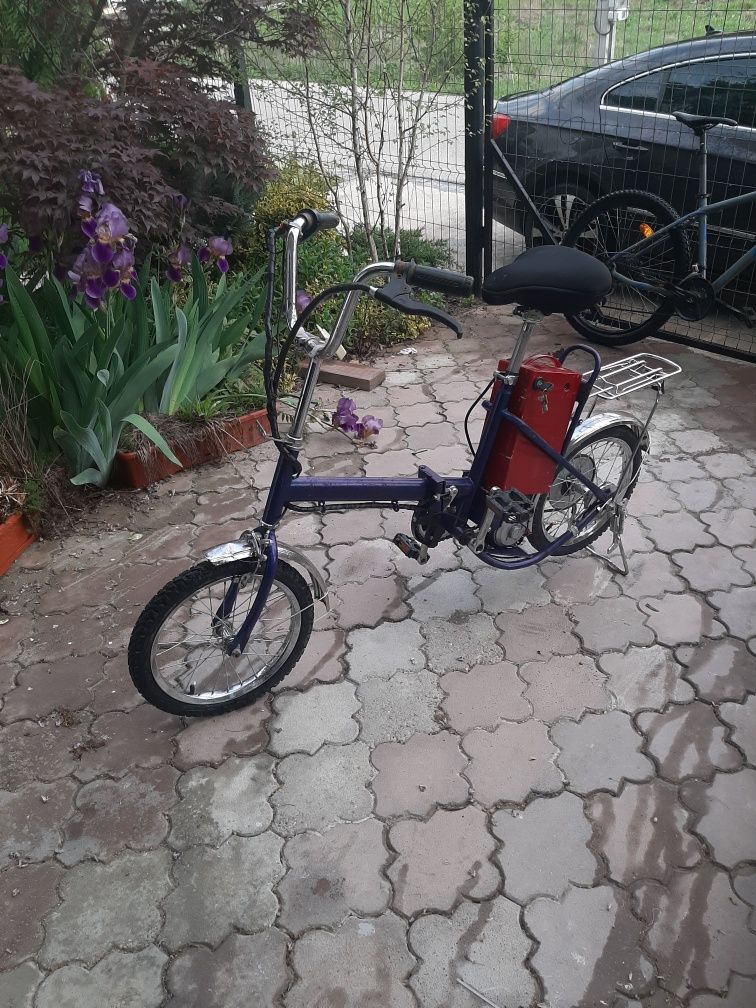 Bicicleta pliabila  roti pe 16 cu motor electric.