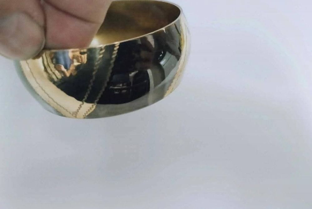 Veche bratara fixa de alama