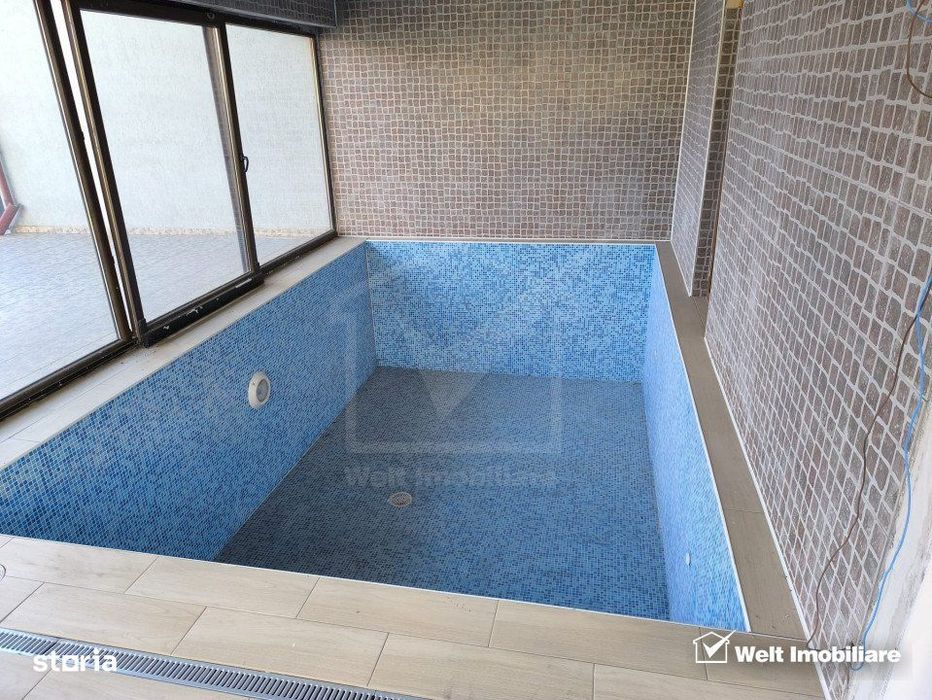 Casa individuala, 246 mp + 40 mp spatiu comercial, piscina interioara,