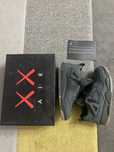 Jordan 4 Black Kaws