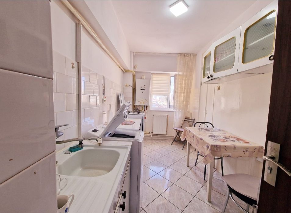 Închiriez 2 camere centru