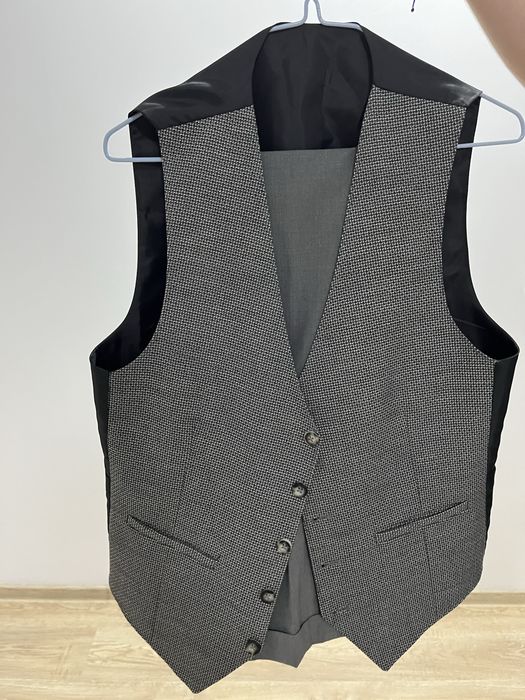 Vesta si pantaloni