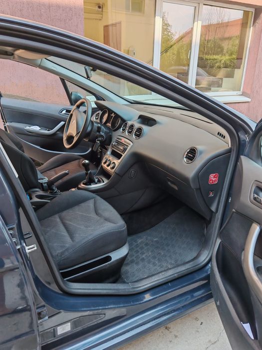 Peugeot 308 ,benzina 1,4 , an 2008