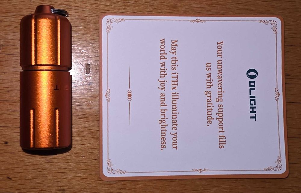 Нов LED фенер Olight iThx (22 грама до 180 лумена) - Оранжев