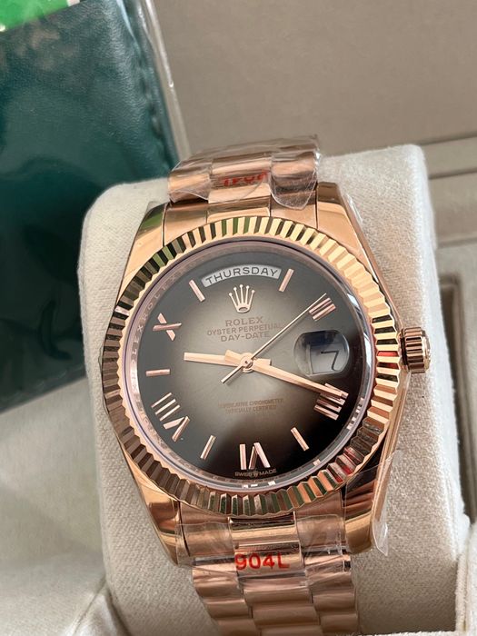 Rolex Day-Date roz gold