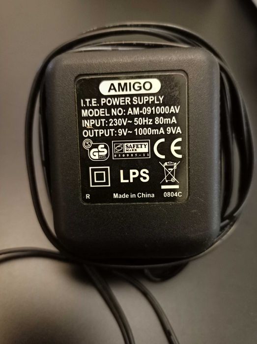 Блок питания 9V 1A Amigo (оригинальный) + модем D-Link в подарок