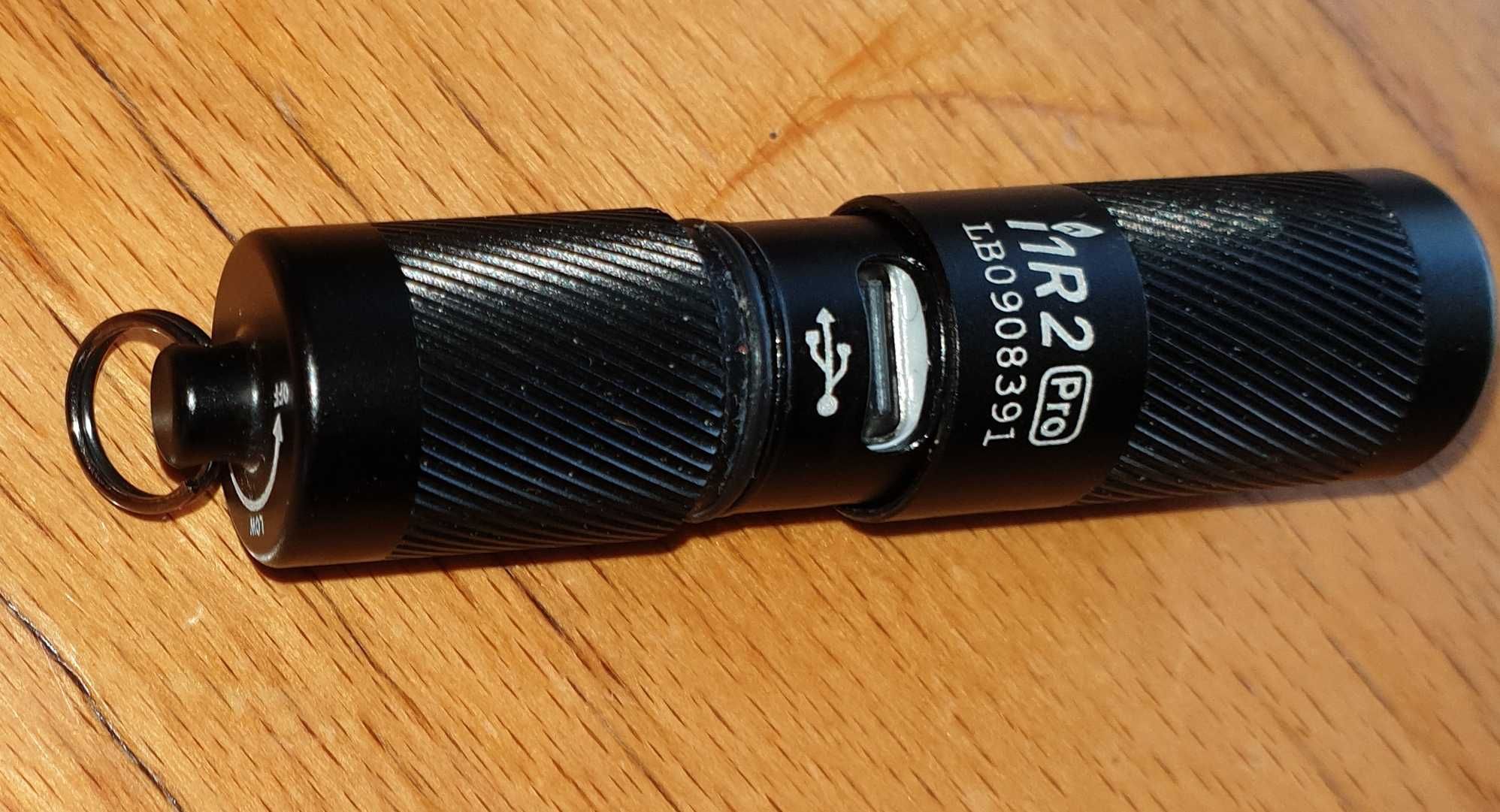 Нов LED фенер Olight i1R 2 Pro EOS (22 грама до 180 лумена) - черен
