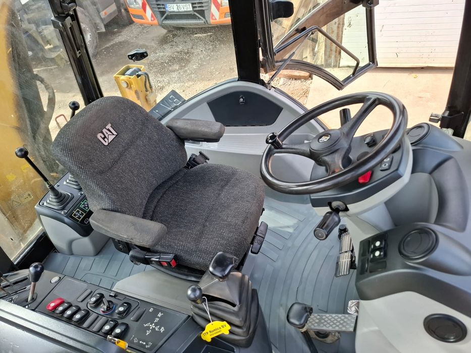 Vand buldoexcavator  cat caterpillar 428F fara ad blue