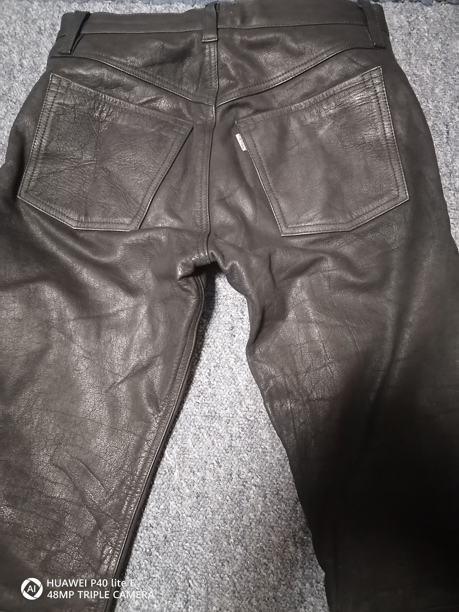 Pantaloni moto din piele