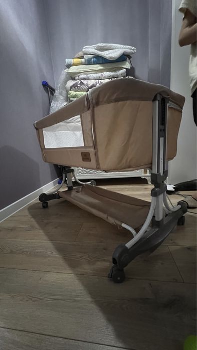 Манеж, люлька и кенгуру